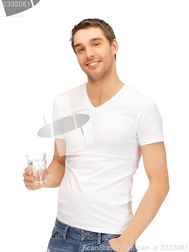 Image of man in white shirt with glass of water