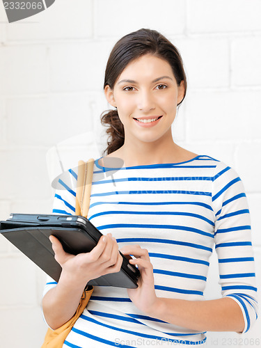 Image of happy teenage girl with tablet pc computer