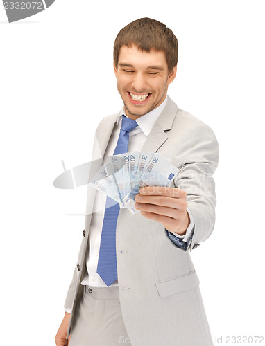 Image of handsome man with euro cash money