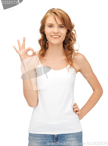 Image of girl in blank white t-shirt showing ok sign