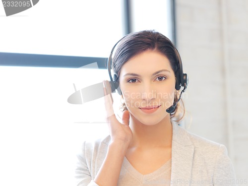 Image of friendly female helpline operator