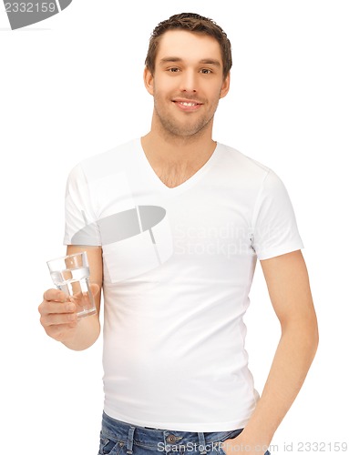 Image of man in white shirt with glass of water