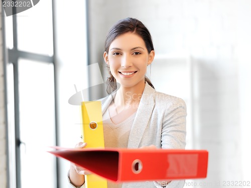 Image of beautiful woman with folder