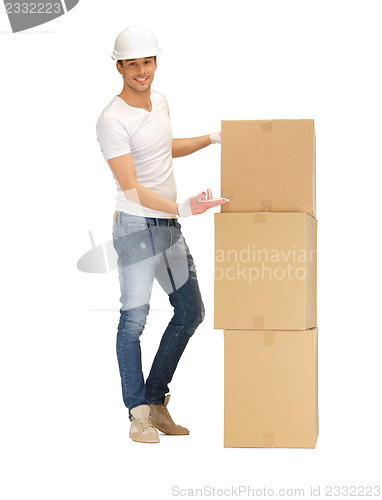 Image of handsome man with big boxes