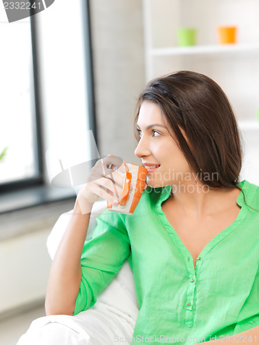 Image of lovely woman with mug