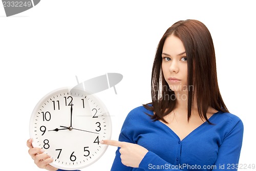 Image of woman holding big clock