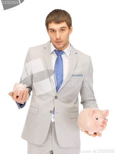 Image of man with piggy bank