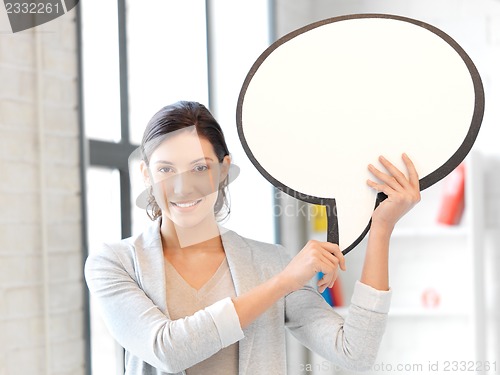 Image of smiling businesswoman with blank text bubble