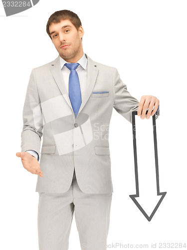Image of businessman with direction arrow sign