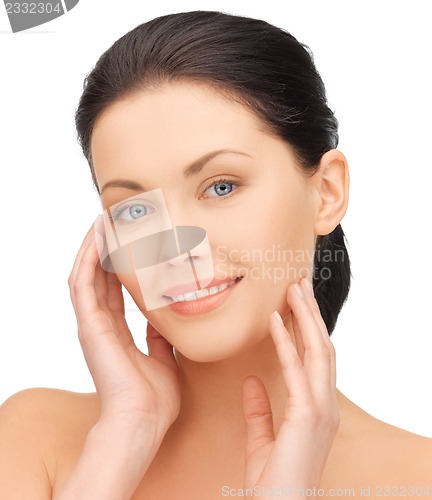 Image of face and hands of beautiful woman