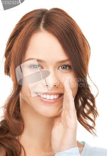 Image of woman whispering gossip