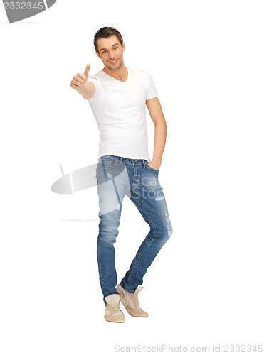 Image of handsome man with thumbs up