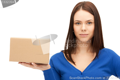 Image of attractive businesswoman with cardboard box