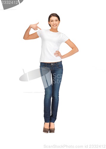 Image of smiling teenage girl in blank white t-shirt