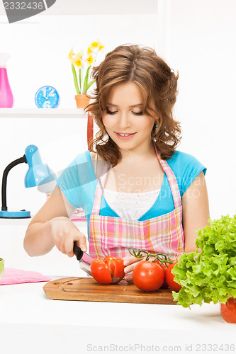 Image of beautiful woman in the kitchen