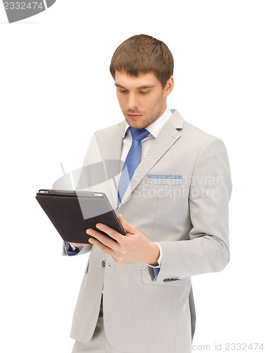 Image of calm man with tablet pc computer