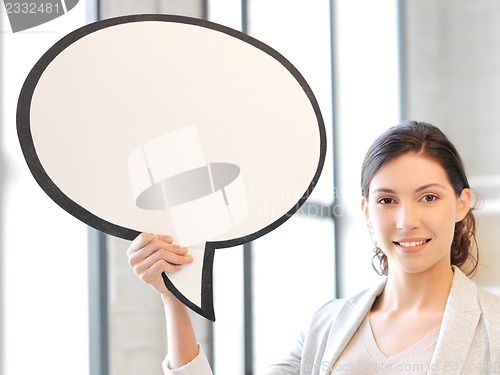 Image of smiling businesswoman with blank text bubble