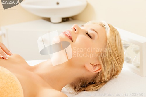 Image of beautiful woman in spa salon