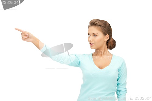 Image of businesswoman pointing her finger