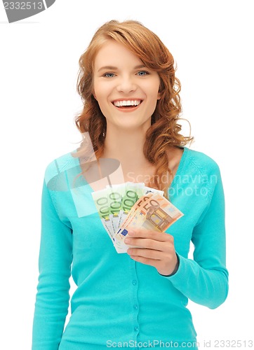 Image of happy teenage girl with euro cash money