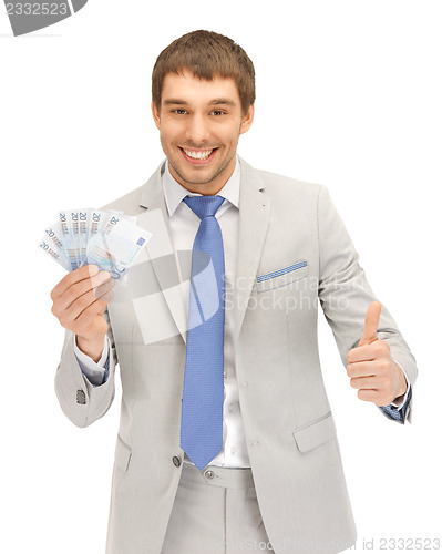 Image of handsome man with euro cash money