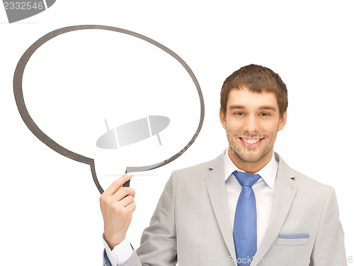 Image of smiling businessman with blank text bubble