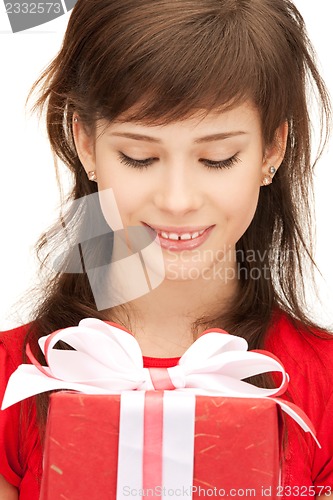 Image of happy teenage girl with gift box