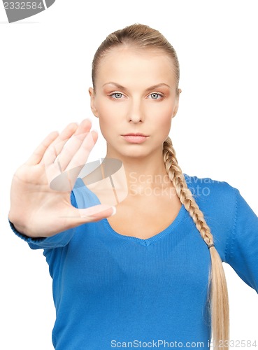 Image of woman making stop gesture