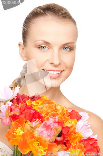 Image of lovely woman with red flowers