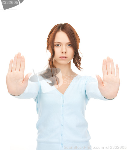 Image of woman making stop gesture