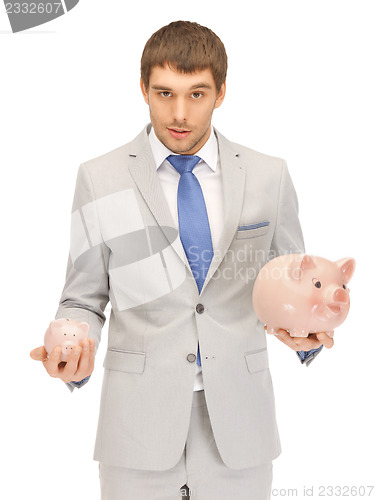 Image of man with piggy bank