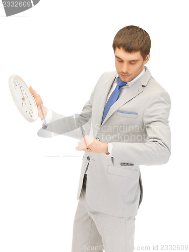 Image of man with clock