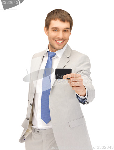 Image of businessman with credit card