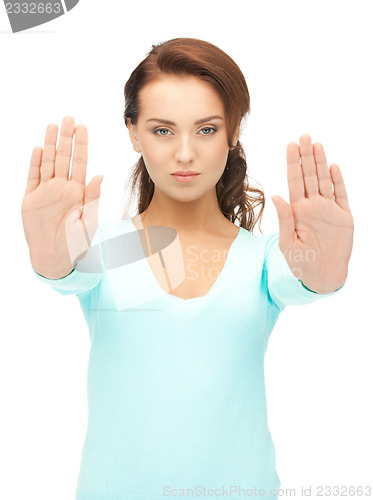 Image of woman making stop gesture