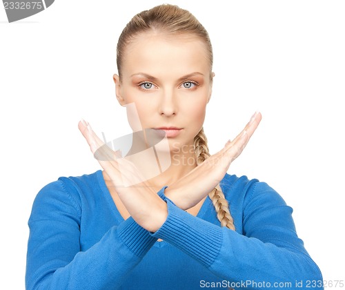 Image of woman making stop gesture