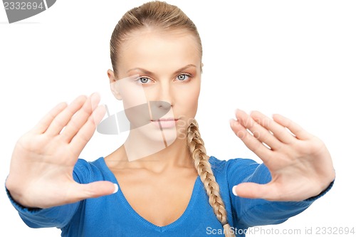 Image of woman making stop gesture