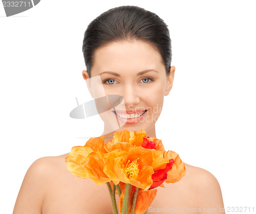 Image of lovely woman with red flowers