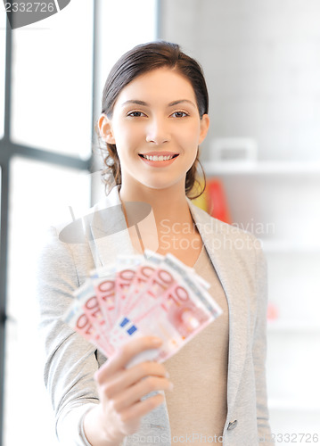 Image of lovely woman with euro cash money