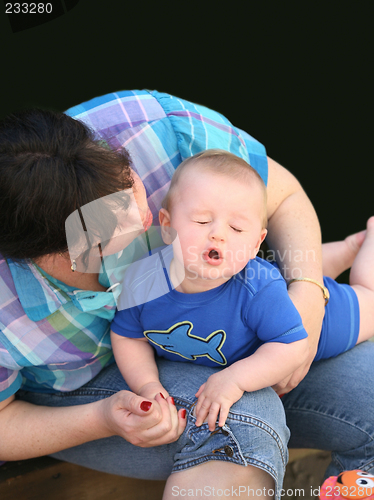 Image of Mother playing with her baby