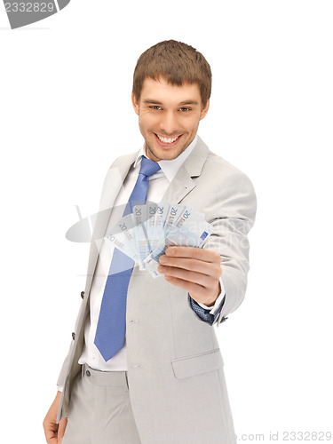 Image of handsome man with euro cash money