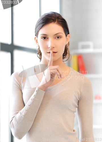 Image of finger on lips