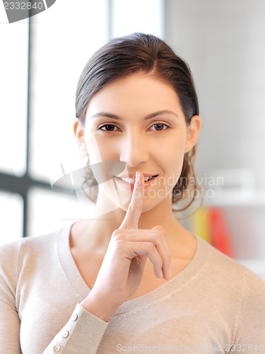 Image of finger on lips