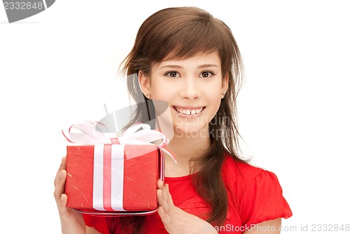 Image of happy teenage girl with gift box