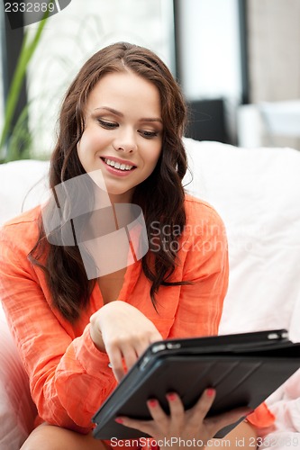 Image of happy woman with tablet pc computer
