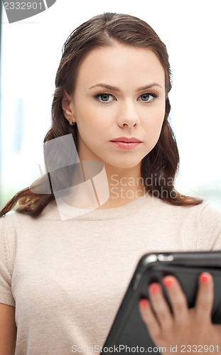 Image of calm woman with tablet pc computer