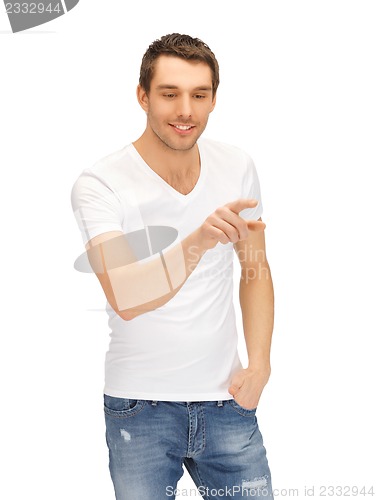 Image of man working with something imaginary