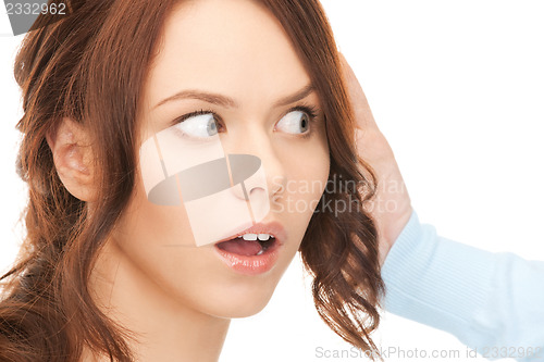 Image of woman listening gossip