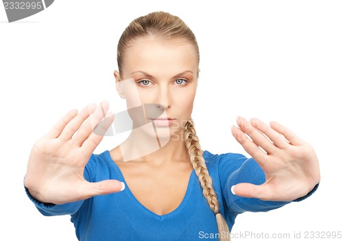 Image of woman making stop gesture