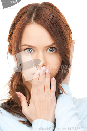 Image of woman with hand over mouth