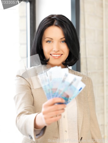 Image of lovely woman with euro cash money